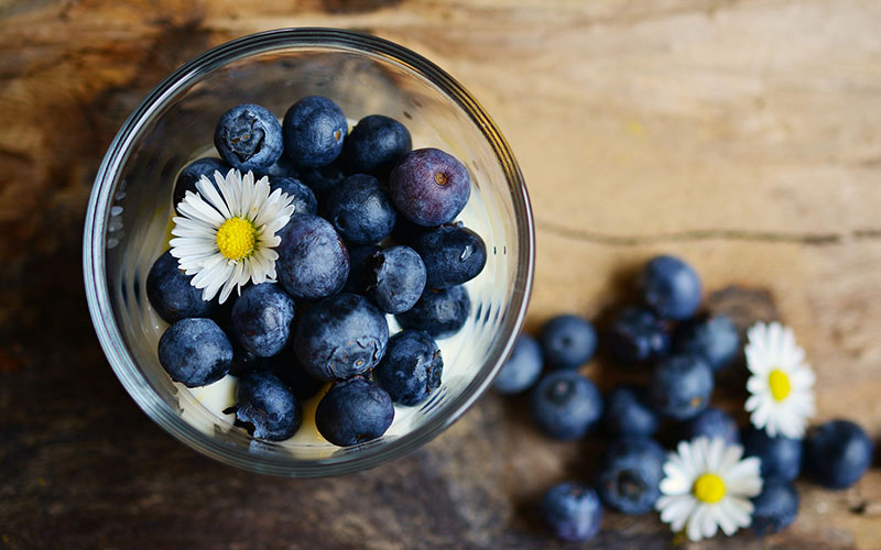 Blueberries in a glass container