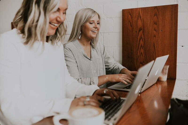 Women working on laptops