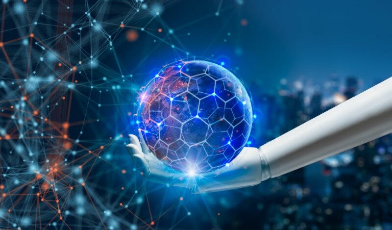Artificial intelligence robotic hand holding a digital rendering of a globe
