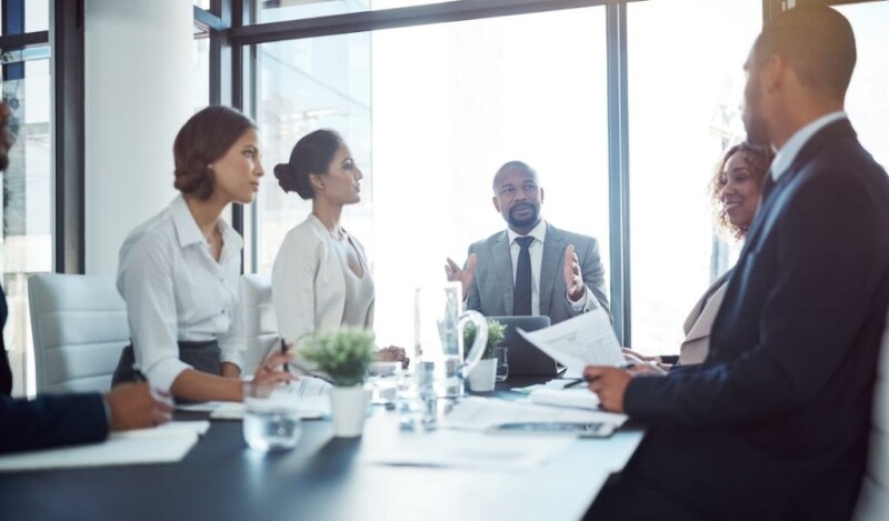 Colleagues talking in a meeting