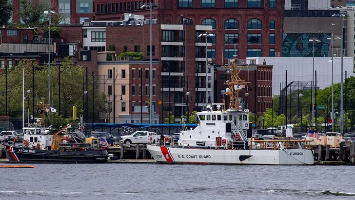 Two U.S. Coast Guard vessels sit in port in Boston Harbor across from the USCG station in Boston, Mass. (Joseph Prezioso/AFP via Getty Images/File/Fox News)