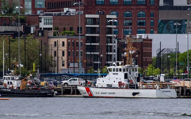 Two U.S. Coast Guard vessels sit in port in Boston Harbor across from the USCG station in Boston, Mass. (Joseph Prezioso/AFP via Getty Images/File/Fox News)