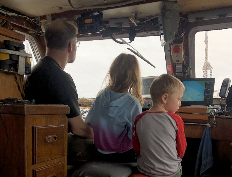 Fisherman Joel Collier of West Coast Wild Scallops and his wife Melissa, have run the small family operation since 2017 in BC, Canada. Joel is pictured here with his son, Caleb and daughter Cora.