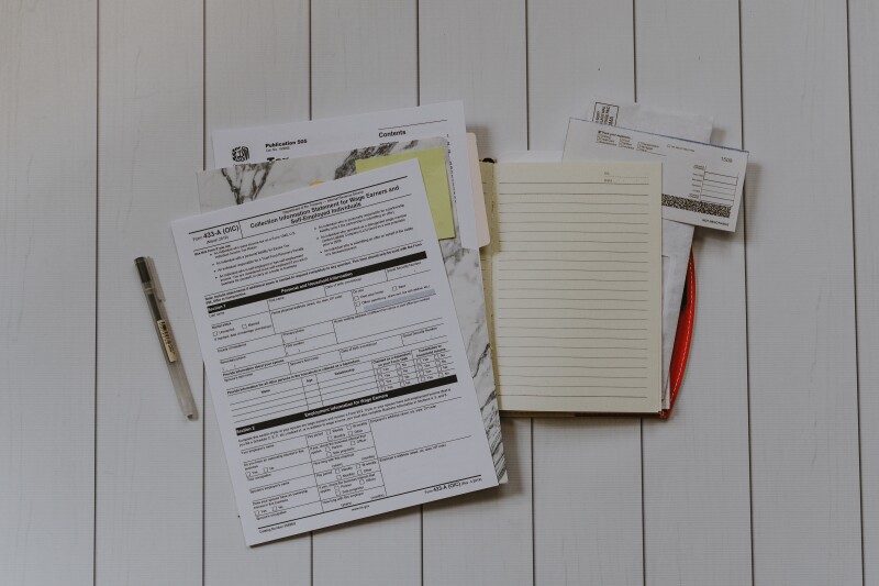 A display of self-employment tax forms on the table