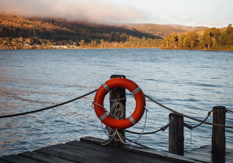 Life preserver on a dock. Photo by Roan Lavery on Unsplash