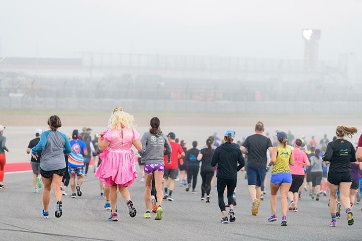 Running 5K in pink dress