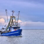 Fishing boat cloudy sky