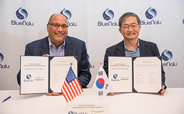 BlueNalu President and CEO Lou Cooperhouse and Pulmuone CTO Sang Yun Lee posing with a signed MoU.