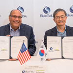 BlueNalu President and CEO Lou Cooperhouse and Pulmuone CTO Sang Yun Lee posing with a signed MoU.