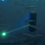 A Stingray Marine Solutions laser system removing sea lice from salmon.