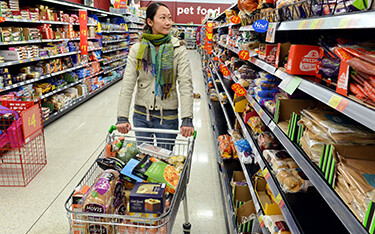 A U.K. shopper in a grocery aisle