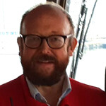 A headshot of Carl-Erik Arnesen.