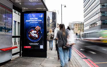 A Norwegian Seafood council advertisement at a bus stop in the U.K.