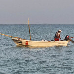 A Yucatan octopus fisherman on his boat.