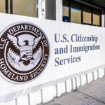 A photo of a U.S. Citizenship and Immigration Services building.