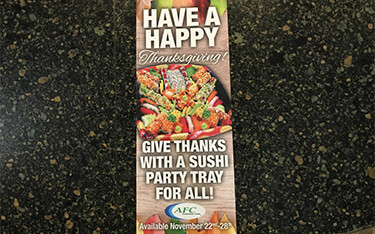 An advertisement for a Thanksgiving sushi platter from AFC.