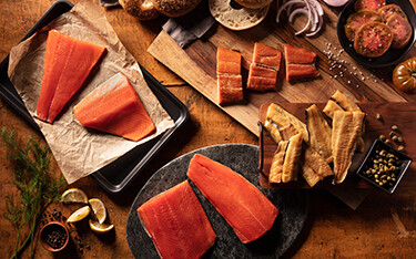 Sitka Seafood salmon fillets laid out on kitchen counter.