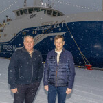 Samherji Managing Director of Ship Operations Kristján Vilhelmsson and Samherji CEO Thorsteinn Már Baldvinsson in front of the first vessel the company purchased 40 years ago.