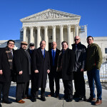 A photo of the plaintiffs at the Supreme Court.