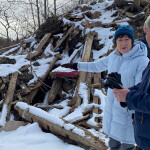 A photo of U.S. Senator Susan Collins (R-Maine) assessing storm damage.