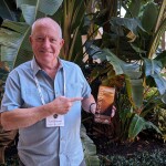 Keith Singleton showing off a pamphlet detailing Alaskan Leader Seafoods' miso black cod.