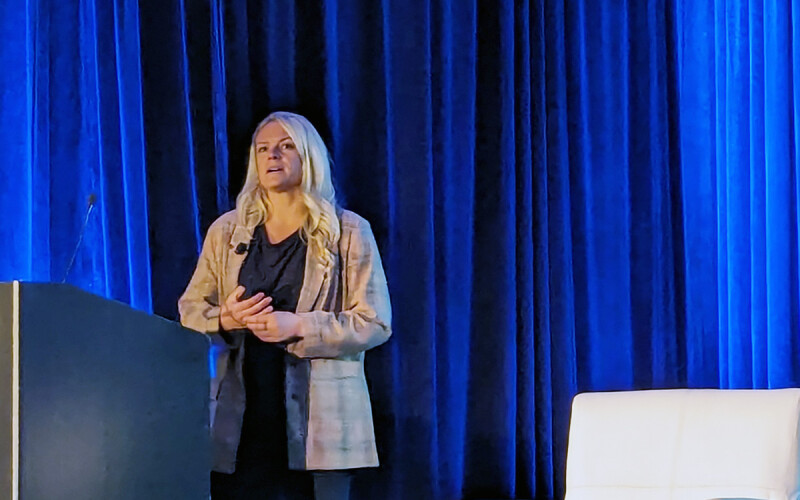 Native AI Co-Founder and COO Sarah Sanders on stage at the Global Seafood Market Conference in 2024.