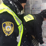 A photo of NOAA officers enforcing SIMP.