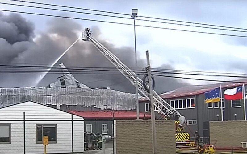 A photo of the Entrevientos salmon processing on fire.