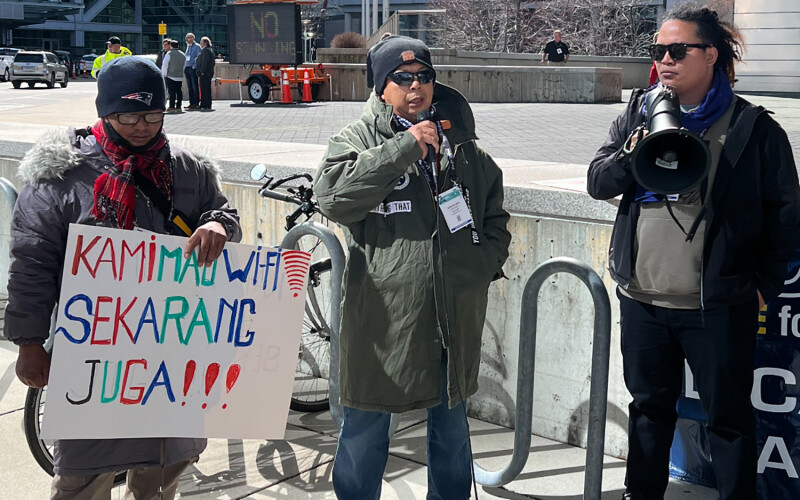 Adrie Nelwan (middle) shares the story of a fishing injury he sustained aboard a Taiwanese vessel in July 2021