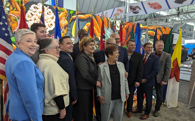 Canadian officials at the Canadian pavilion during Seafood Expo North America