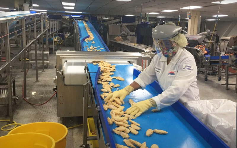 A Trident Seafoods processing worker