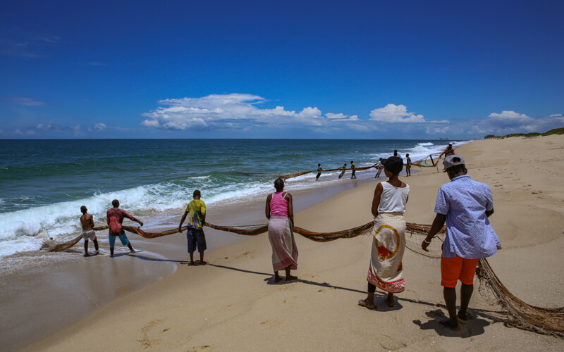 Mozambicans fishing near the country's capital of Maputo