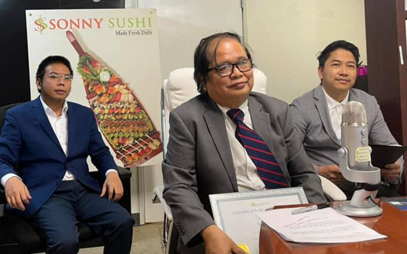 Sonny Sushi Owner Sann Ni (center)
