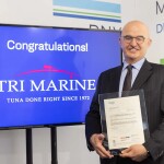 Bolton Food Global Sustainable Development Director receiving the BRCGS Agents and Brokers certificate for Tri Marine Group at the 2024 Seafood Expo Global