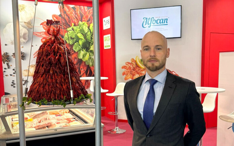 Alfocan General Manager Nicolas Roux standing in the company's booth at Seafood Expo Global