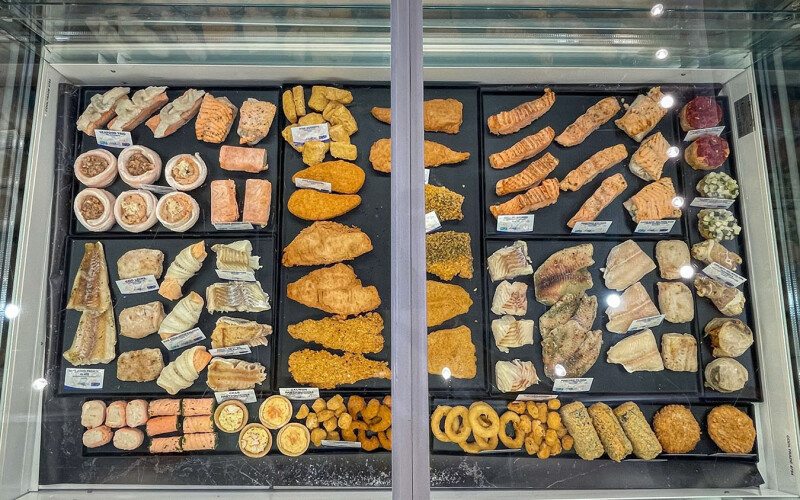 An array of AMfish's products in a display case.