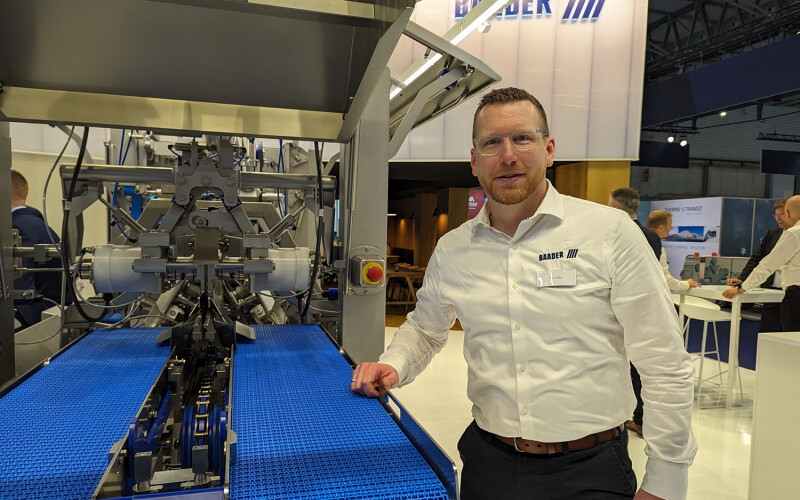 BAADER North America CEO Nils Rabe poses next to one of the company's machines