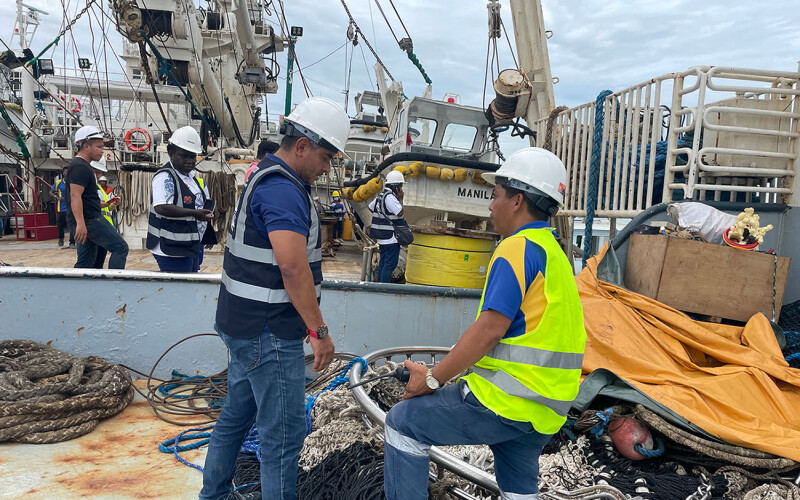 Workers on board a fishing vessel in Papua New Guinea